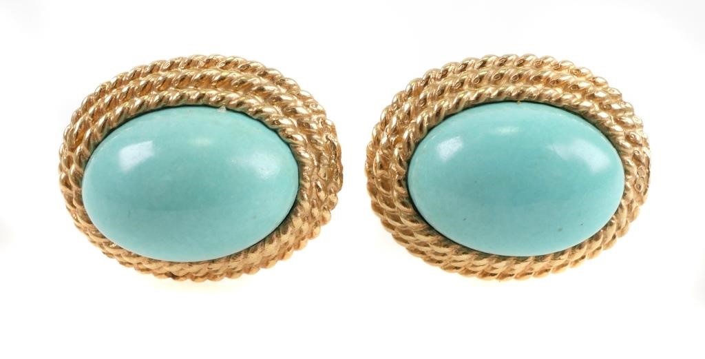 Appraisal: Turquoise cabochons set in a k gold rope frame Each