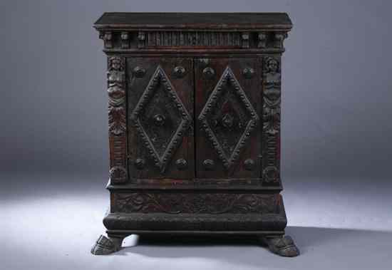 Appraisal: ITALIAN BAROQUE CARVED WALNUT TWO-DOOR CABINET th century Rectangular top