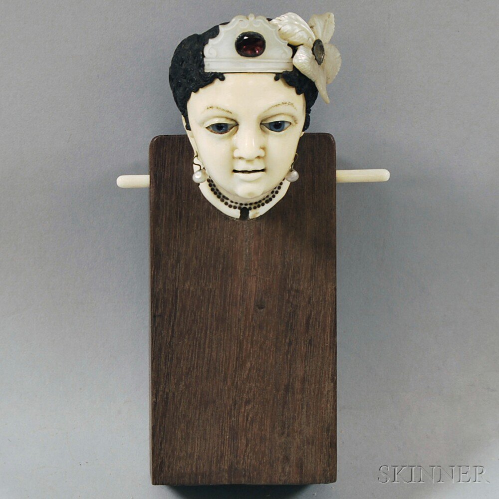 Appraisal: Glass-eyed Ivory Lady's Head on Wooden Stand head and neck