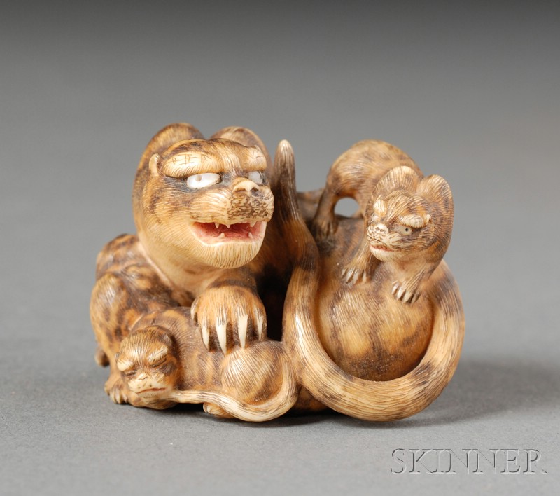 Appraisal: Ivory Netsuke Japan th century study of a tigress with