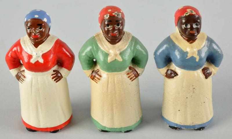 Appraisal: Lot of Cast Iron Hubley Mammy Paperweights Description Includes three