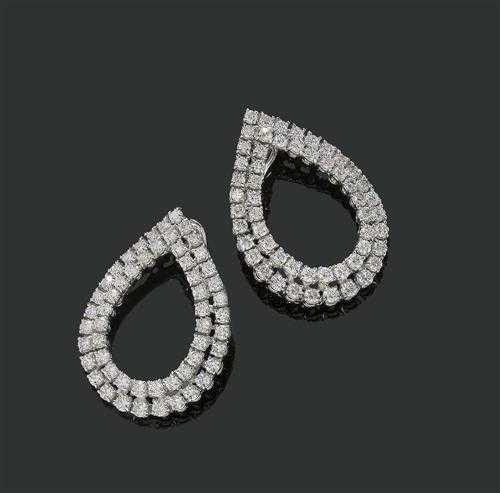 Appraisal: BRILLIANT-CUT DIAMOND CLIP EARRINGS White gold Elegant large clip earrings