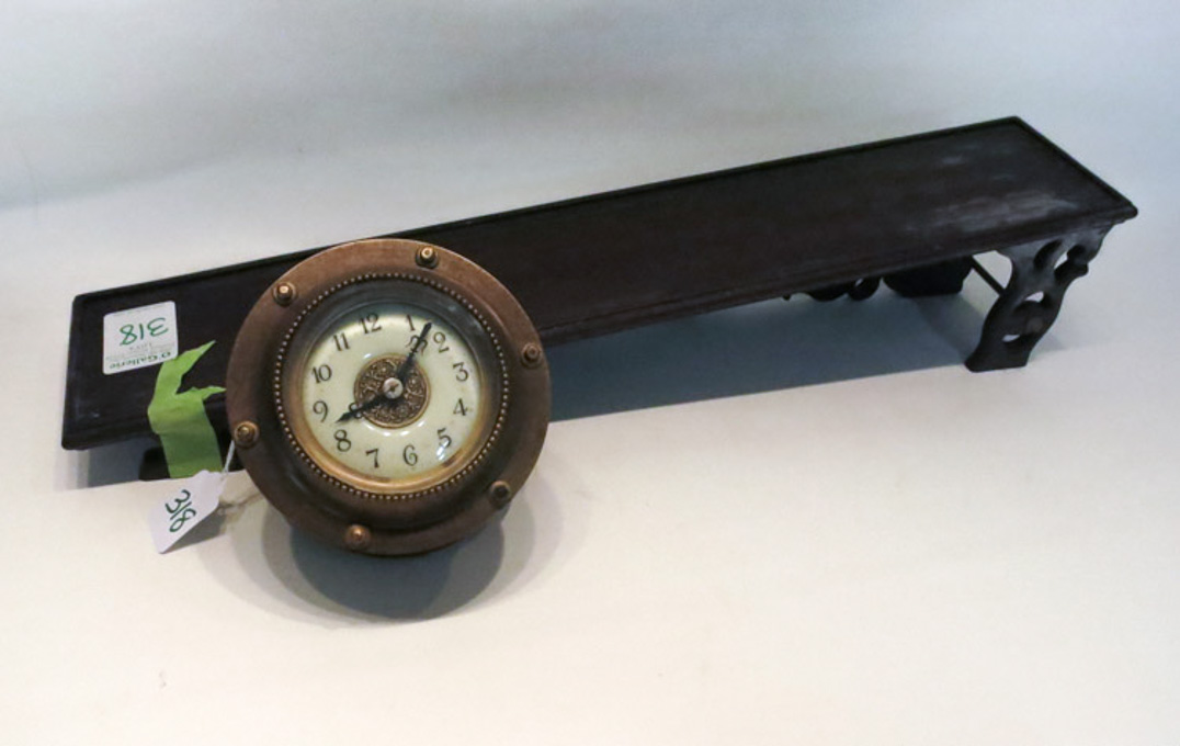 Appraisal: INCLINED PLANE MANTLE CLOCK the drum clock wound by placing