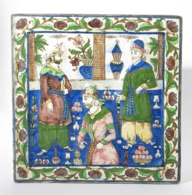 Appraisal: A Persian polychrome moulded tile decorated with three men in