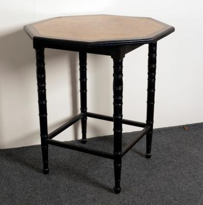 Appraisal: An Edwardian octagonal table with burr yew top and ebonised