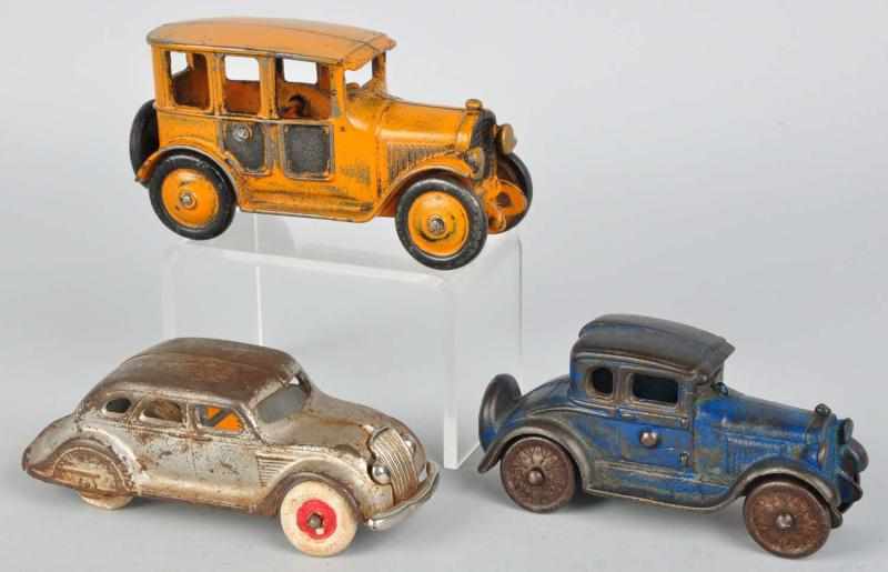 Appraisal: Lot of Cast Iron Automobile Toys American Includes one Airflow