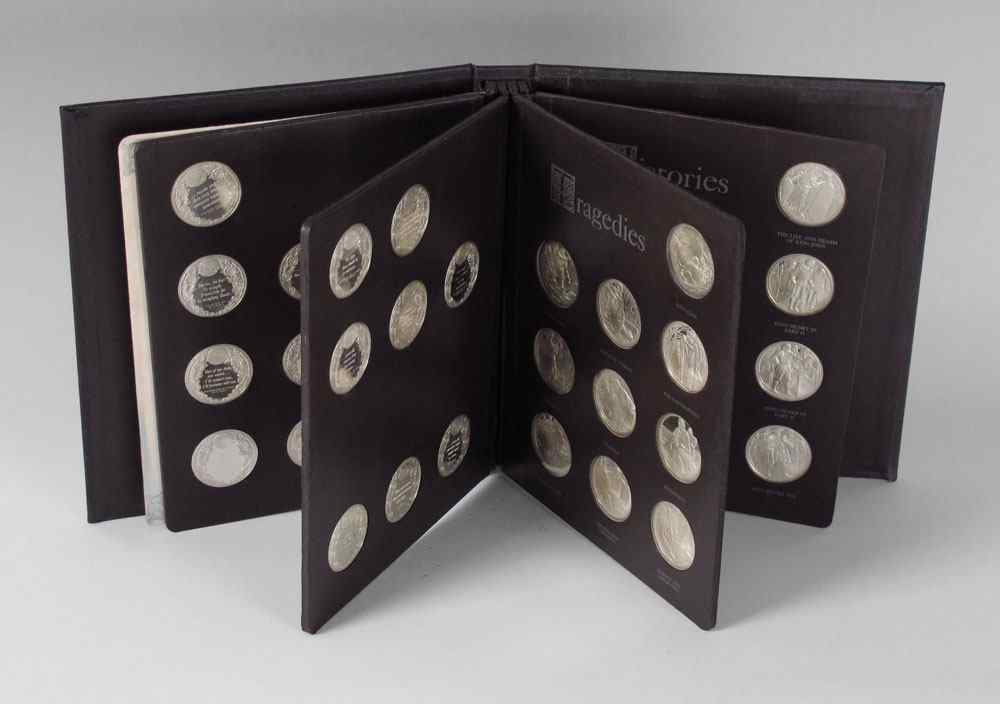 Appraisal: STERLING SILVER ROYAL SHAKESPEARE MEDALS In presentation book sterling medals