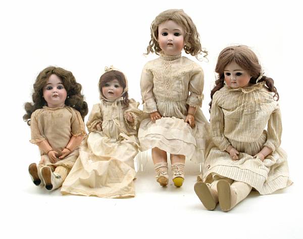 Appraisal: A group of four German bisque headed dolls comprising a