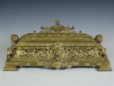 Appraisal: A large th century brass inkstand of tapering rectangular form