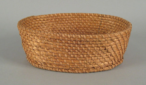 Appraisal: Pennsylvania oval rye straw basket late th c very tightly