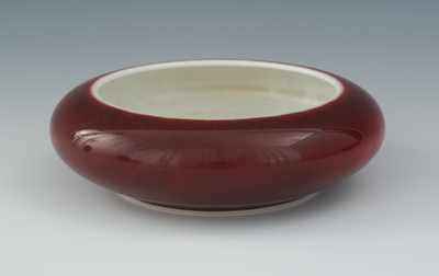 Appraisal: A Small Red Glazed Porcelain Brush Wash Chinese Shallow form