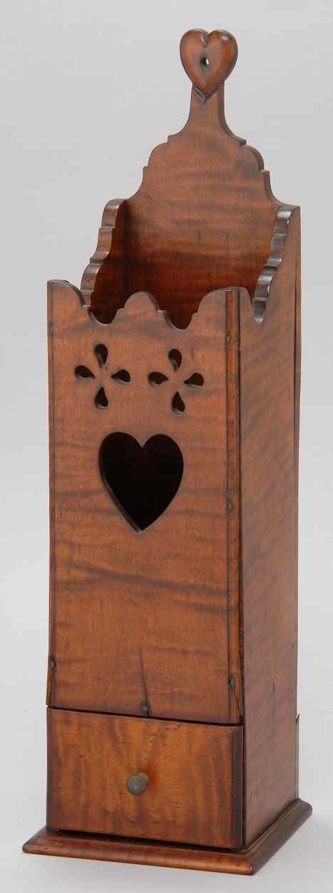 Appraisal: ANTIQUE AMERICAN WALL-MOUNTED CANDLE BOX In tiger maple with pierced