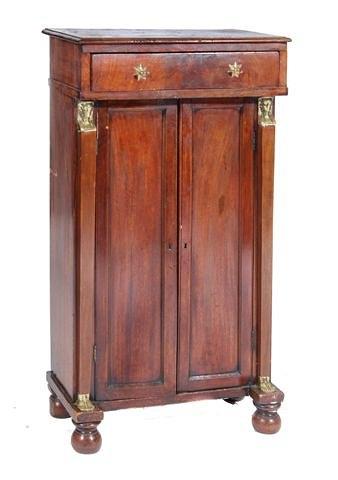 Appraisal: A TH CENTURY REGENCY STYLE MAHOGANY PIER CABINET fitted one