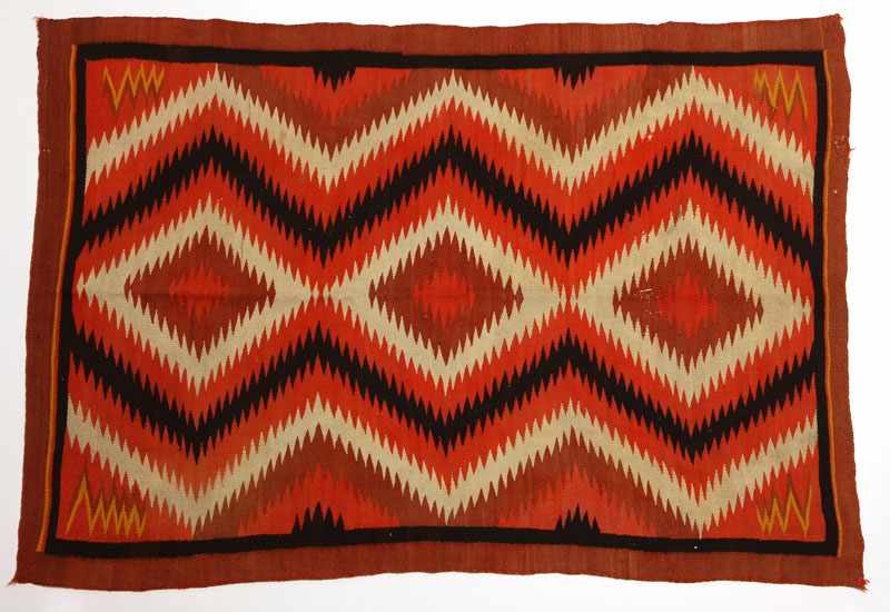 Appraisal: Circa red orange field geometric saw-tooth design in cream and