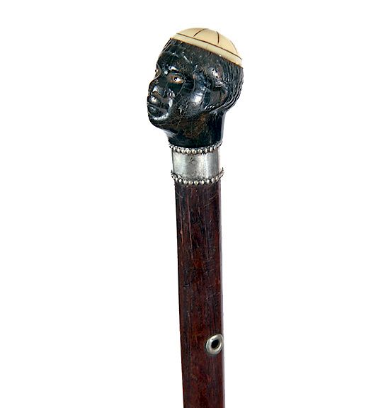 Appraisal: Blackamoor Dress Cane Ca - A carved Blackamoor with two