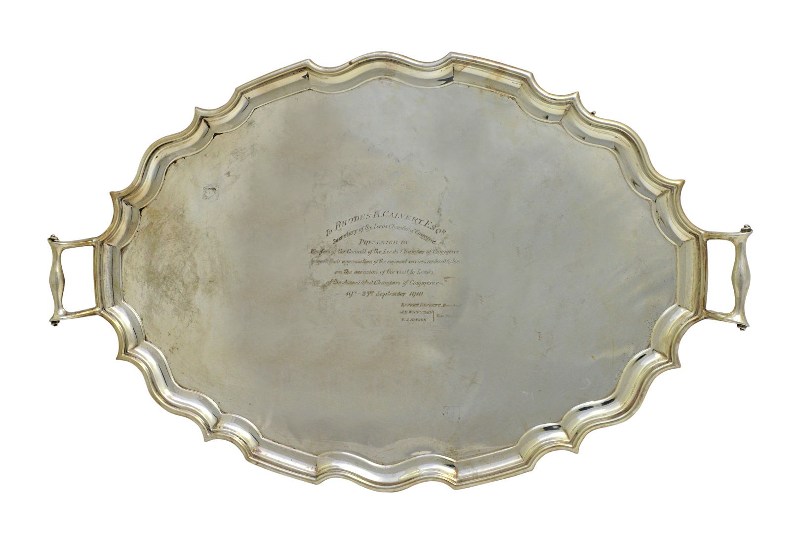 Appraisal: A silver shaped oval twin handled tray having a pie-crust