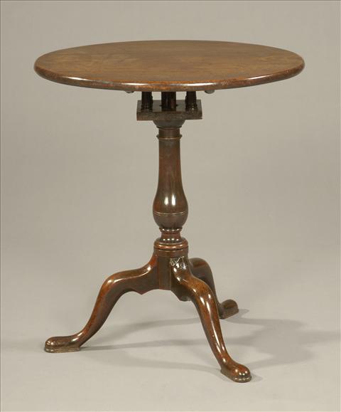 Appraisal: A George II walnut circular tea table mid- th century