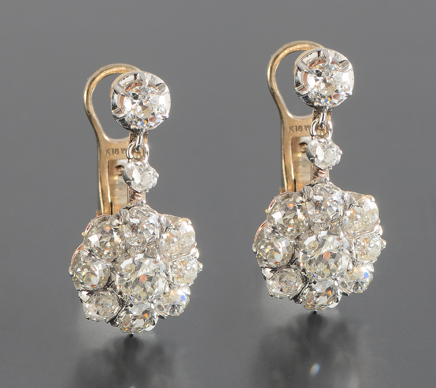 Appraisal: K WITH PLATINUM EDWARDIAN DIAMOND EARRINGS Cluster of old mine