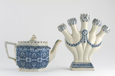 Appraisal: A pearlware five-branch tulipi re moulded and painted in blue