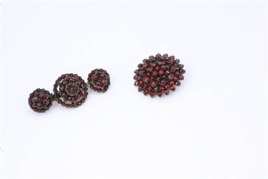 Appraisal: TWO GARNET PINS One is a bar pin with three