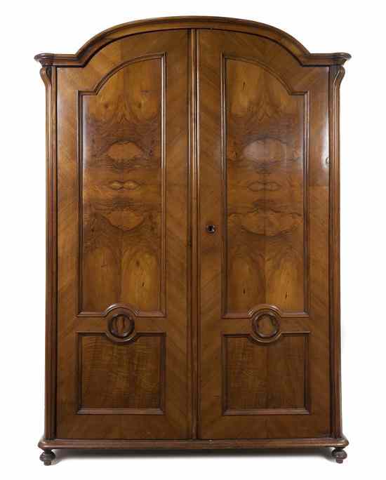 Appraisal: A Pair of Burl Walnut Armoires having domed cornices over