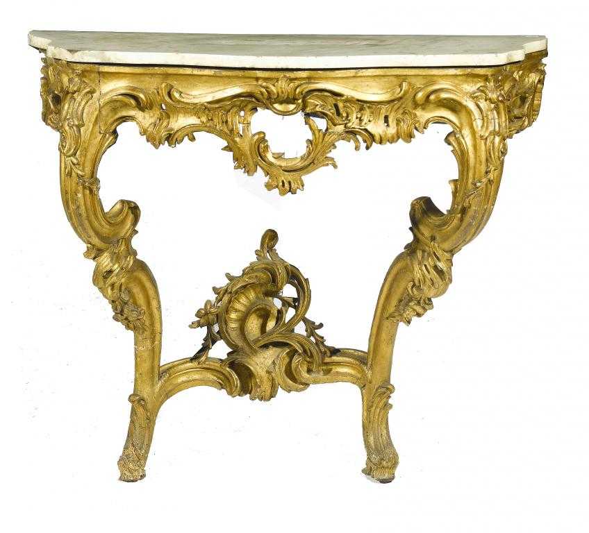 Appraisal: A GILTWOOD CONSOLE TABLE with serpentine marble slab above the