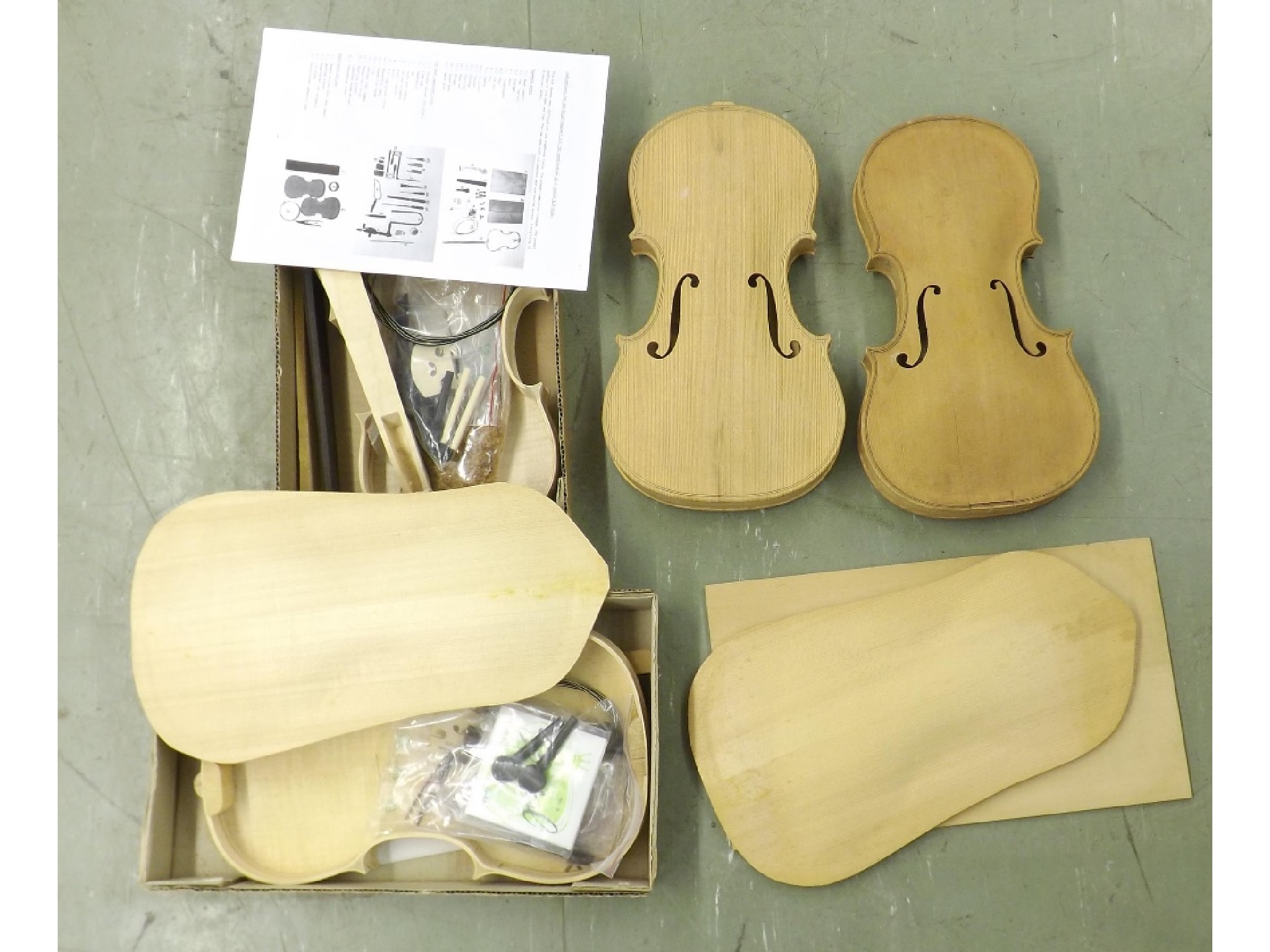 Appraisal: Two violin bodies in the white both labelled Eric Voigt