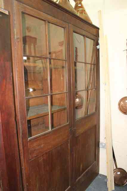 Appraisal: A LARGE TH CENTURY COUNTRY HOUSE PANTRY CUPBOARD the twin