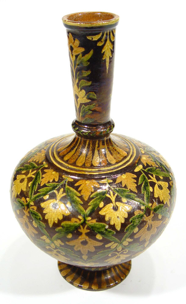 Appraisal: Middle Eastern tin glazed pottery vase enamelled with stylised flowers