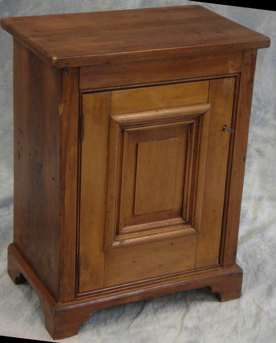 Appraisal: Pine counter top cupboard with raised panel door w d