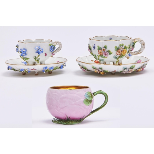 Appraisal: Two graduated Meissen floral encrusted cabinet cups and saucers c