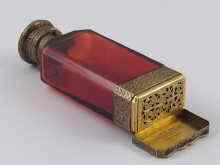 Appraisal: A fine ruby glass combination scent bottle vinaigrette by Samson