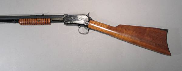 Appraisal: A Winchester Model slide action rifle Serial no Long Rifle