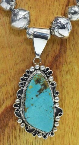 Appraisal: Native American silver content unknown necklace sterling pendant with bezel-set