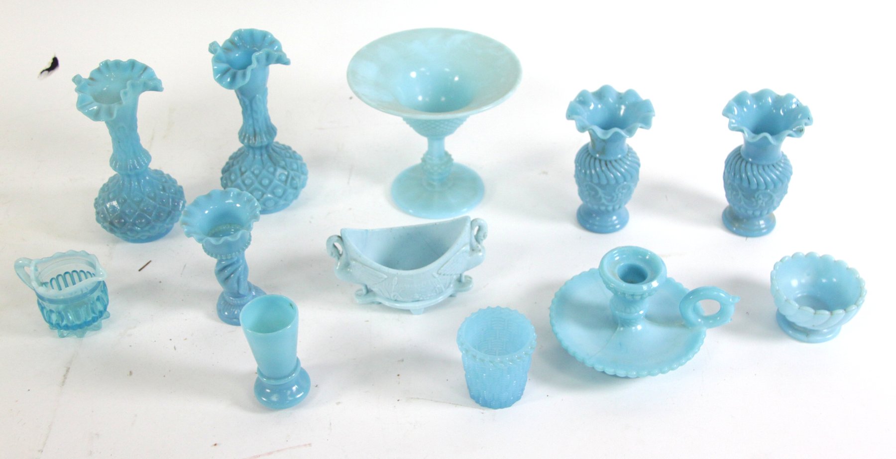 Appraisal: A collection of pale blue moulded glass including six vases