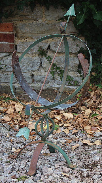 Appraisal: AN OLD GREEN PAINTED IRON ARMILLARY SPHERE cm tall