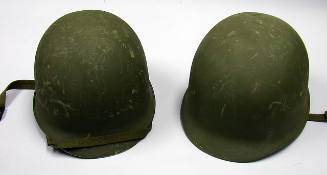 Appraisal: Lot consists of M- style combat helmets both equipped with