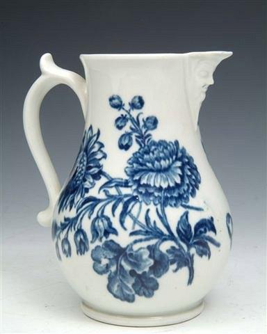 Appraisal: A WORCESTER MASK HEAD JUG decorated in underglaze blue with