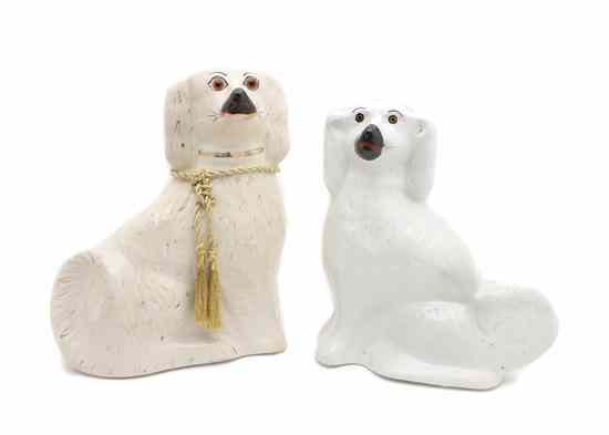 Appraisal: Two Staffordshire Spaniels Height of the larger inches