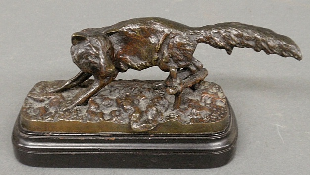 Appraisal: - Bronze fox sculpture mounted on an ebonized wood base