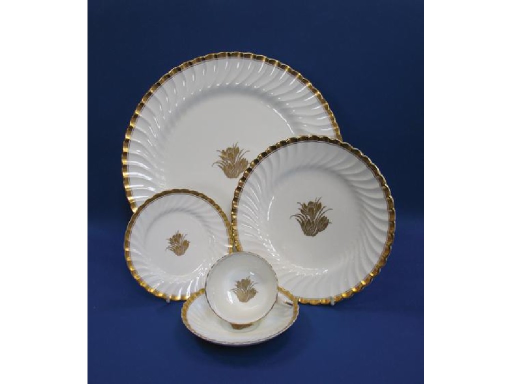 Appraisal: A MINTON'S TIFFANY CO DINNER SERVICE of swirl scalloped edge