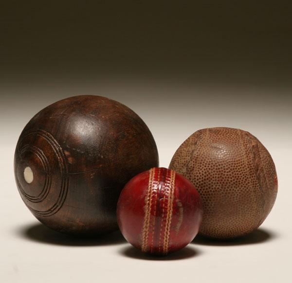 Appraisal: Lot of three antique game balls including a pigskin baseball