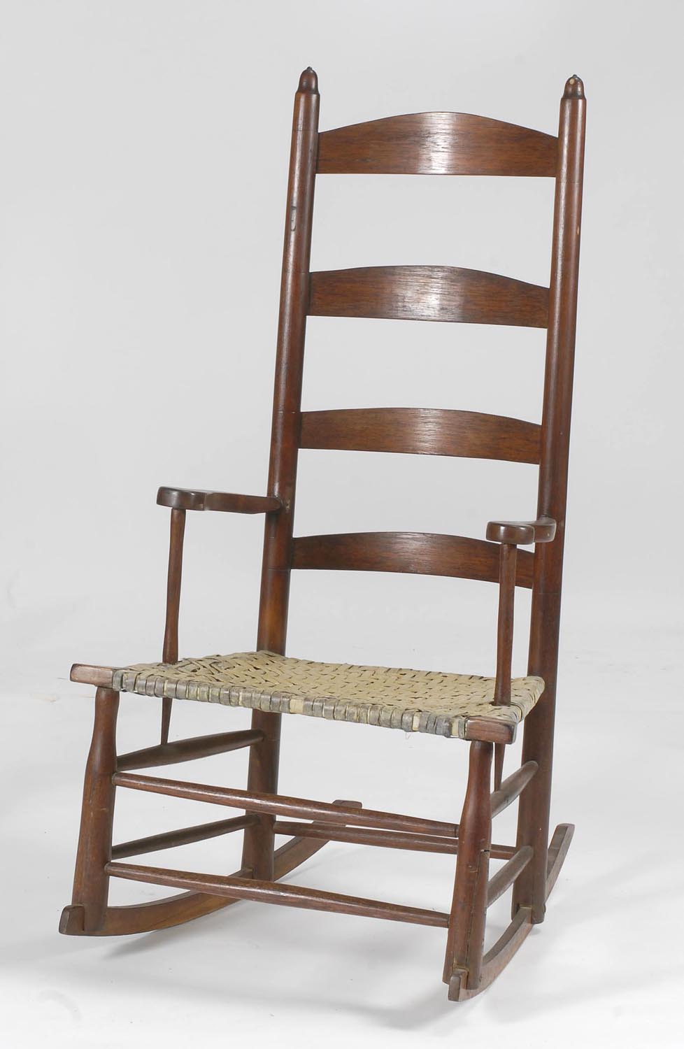 Appraisal: LATE TH EARLY TH CENTURY ARMED ROCKER with splat back