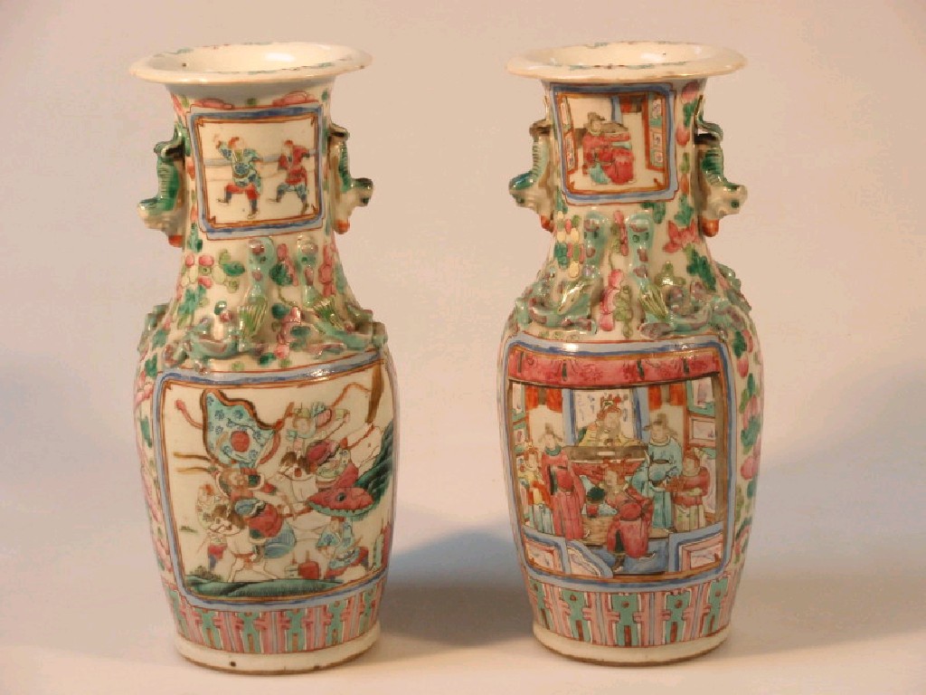 Appraisal: A pair of thC Chinese famille rose vases painted with