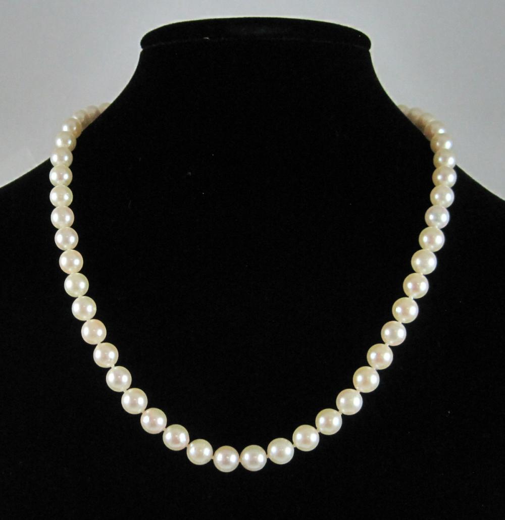 Appraisal: PRINCESS LENGTH PEARL AND FOURTEEN KARAT GOLD NECKLACE hand knotted