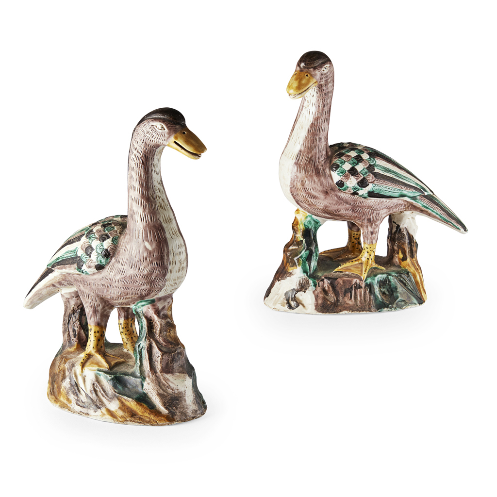 Appraisal: PAIR OF FAMILLE VERTE BISCUIT-GLAZED DUCKS QING DYNASTY TH CENTURY