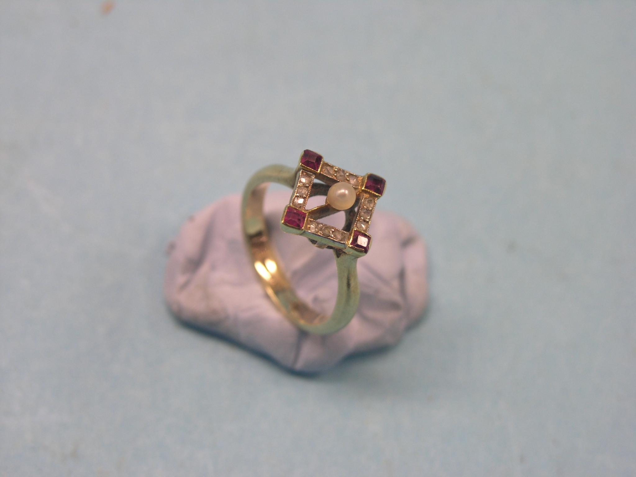 Appraisal: A ct gold dress ring set four rubies seed-pearl and