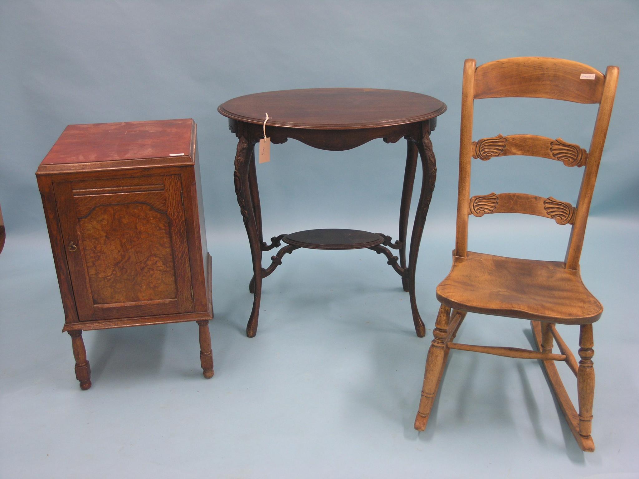 Appraisal: A late Victorian mahogany occasional table oval-shape with braced undertier