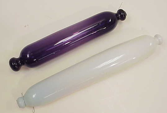 Appraisal: Two blown glass rolling pins the first opalescent Bristol glass