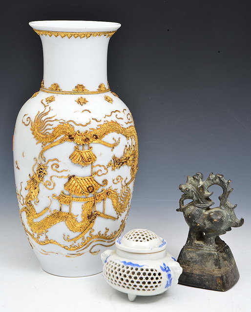 Appraisal: A CHINESE WHITE GROUND PORCELAIN BALUSTER VASE with raised gilt